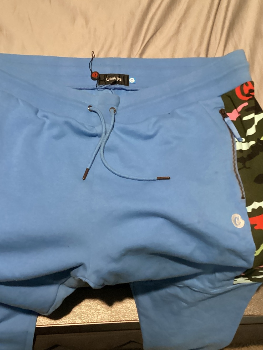 Light Blue Athletic Drawstring Shorts with Camo Zip Accent
